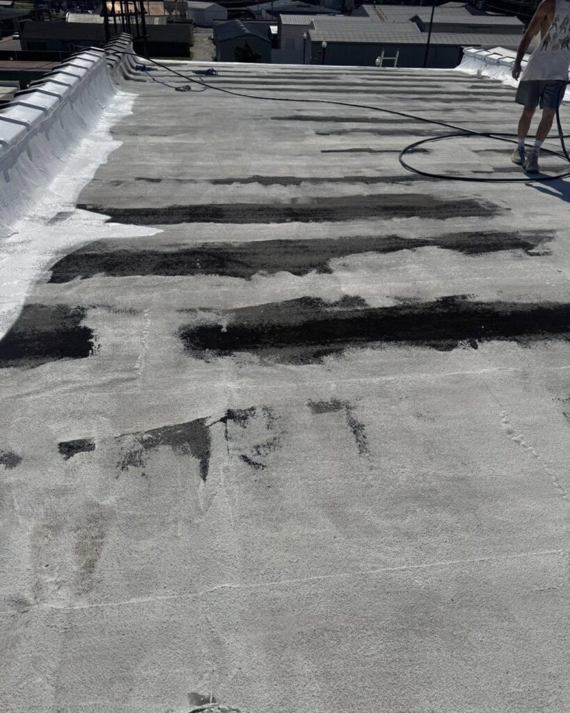 A before look at a commercial roof in Neosho right before adding Polyglass Silicone