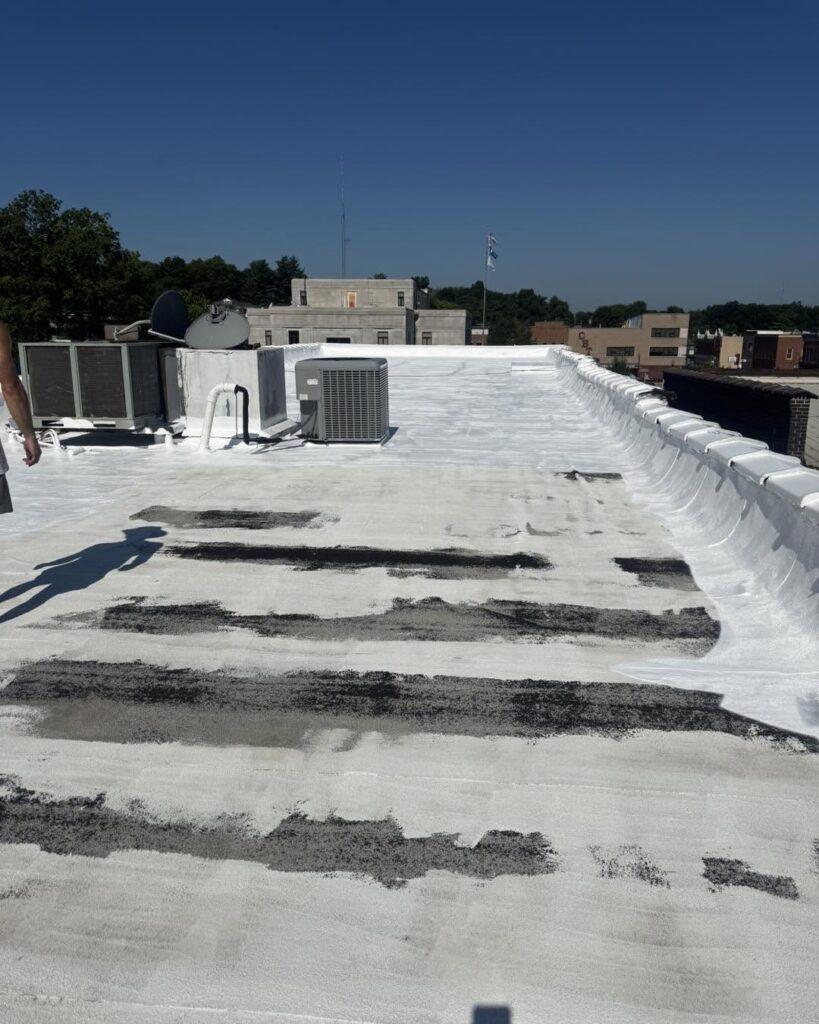 A before look at a commercial roof in Neosho right before adding Polyglass Silicone