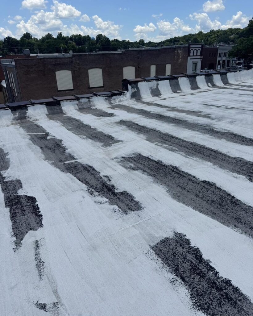 A before look at a commercial roof in Neosho right before adding Polyglass Silicone